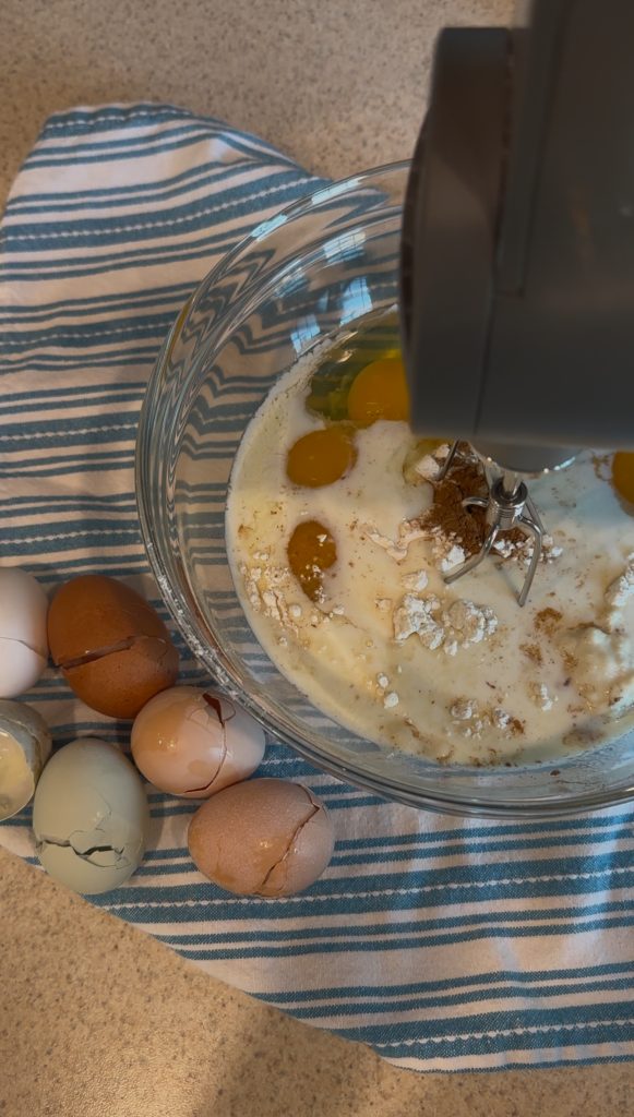 dutch baby pancake ingredients in bowel ready to mix with hand mixer.